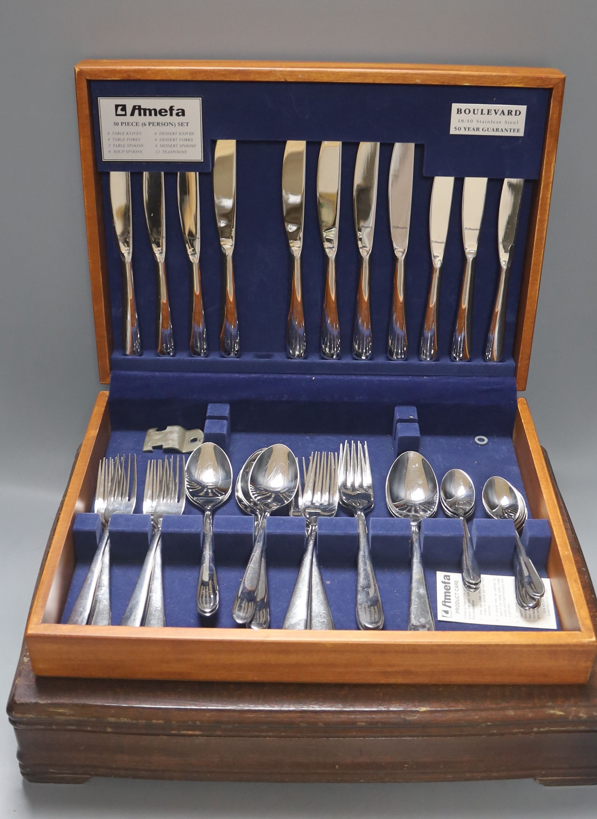 A service of Rogers Bros plated flatware in mahogany canteen and another canteen of plated flatware (2)